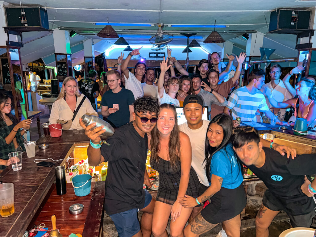 Aly and her four staff members behind the bar smiling