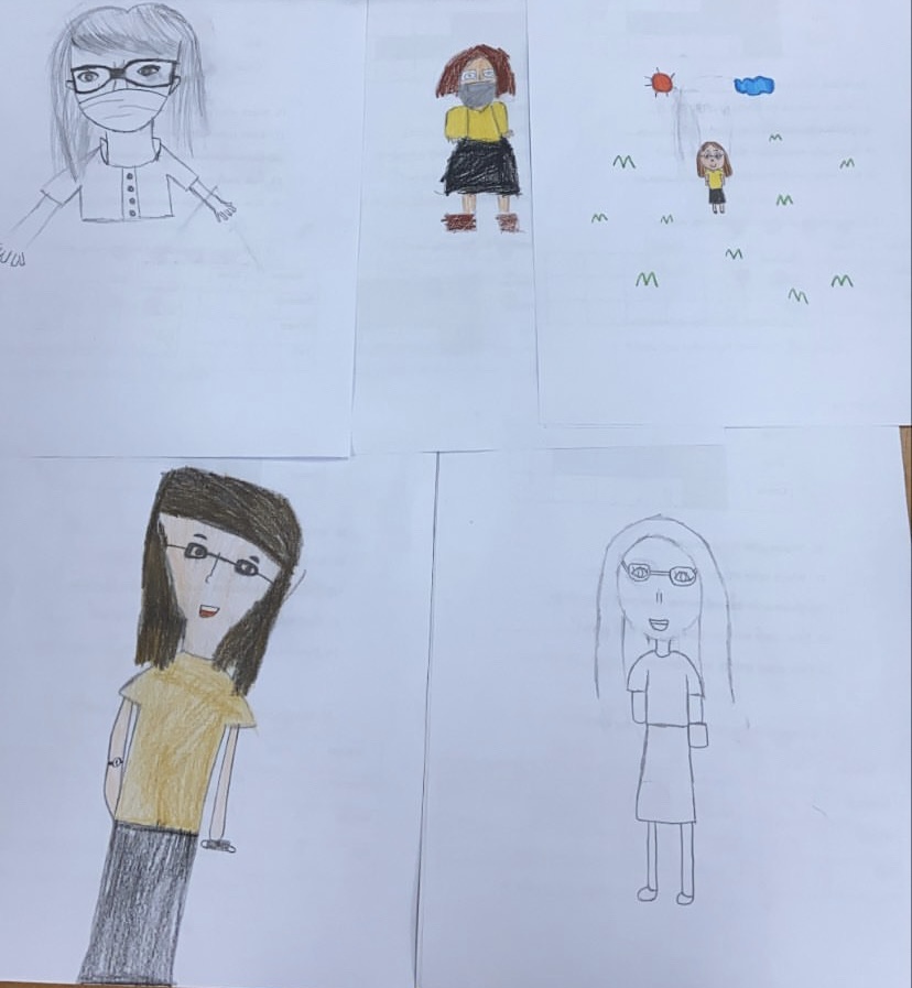 Hand drawn pictures of Aly made by her students